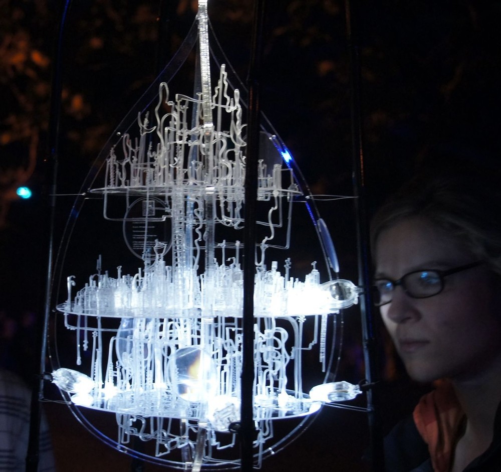 Visitors to Art in the Dark admire the installations